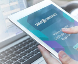 The free SmartCompliance guide "9 Ways to Improve Certificate of Insurance Response Rates" on an iPad.