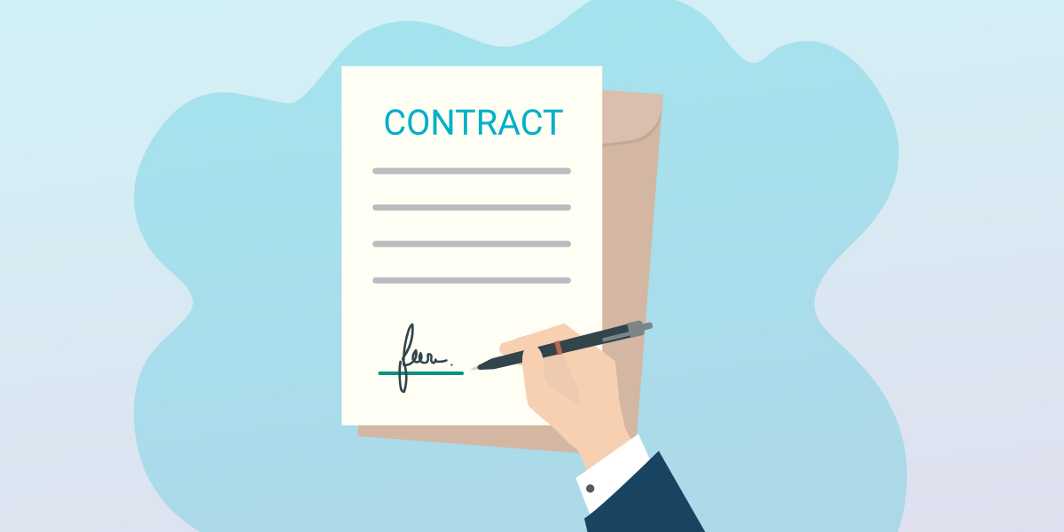 A person signing a contract.